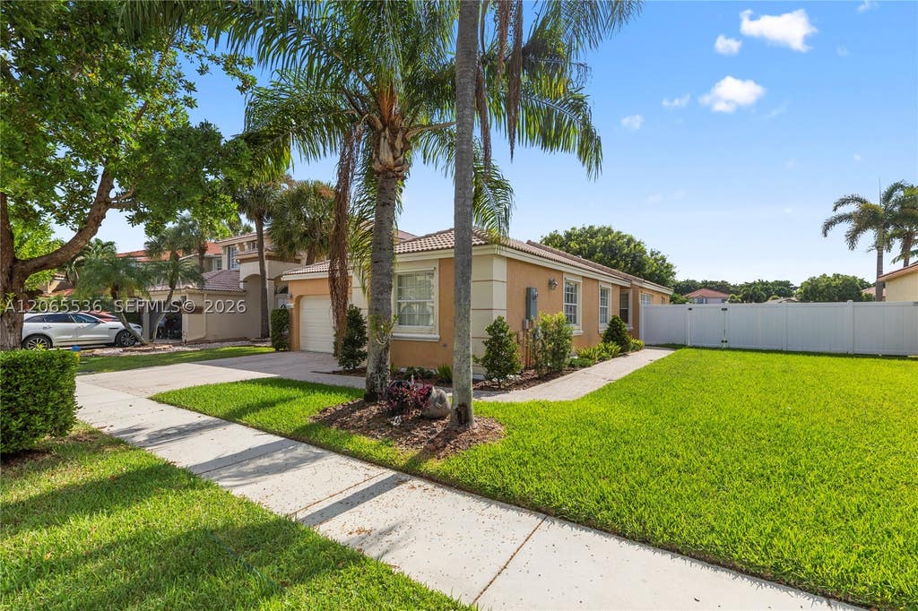 Photo of 363 NW 158th Ave, Pembroke Pines, FL 33028 (MLS # A12065536)