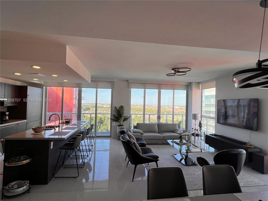 Amazing beautiful corner 3-bedroom, 3-bathroom condo located in the heart of Doral. This stylish unit features elegant tiled floors, stainless steel Bosch appliances, an oversized refrigerator, sleek Porcelanosa cabinetry, high-impact windows and doors, and a spacious balcony perfect for relaxing. Includes covered parking for your convenience, along with two assigned parking spaces. The community boasts a modern clubhouse with a pool, gym, sauna, and more. This mixed-use development also offers easy access to restaurants and retail shops on the ground floor. Perfectly situated just minutes from top-rated schools, parks, and major highways. Maintenance includes water, sewer, cable, and internet for a worry-free lifestyle.