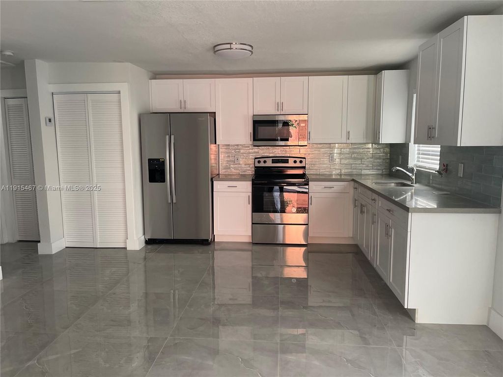 Photo of 4281 Riverside Dr #1, Coral Springs, FL 33065 (MLS # A11915467)