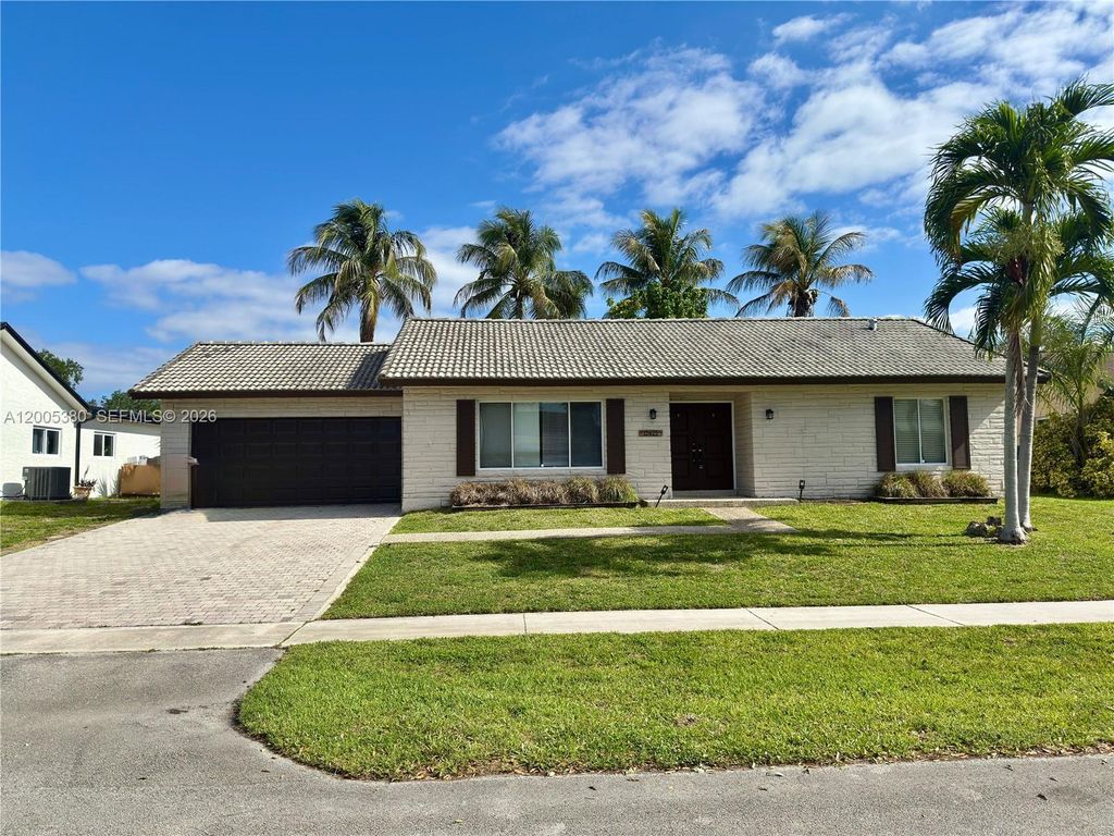Photo of 13425 NW 10th St, Sunrise, FL 33323 (MLS # A12005380)