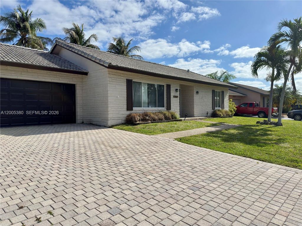 Photo of 13425 NW 10th St, Sunrise, FL 33323 (MLS # A12005380)