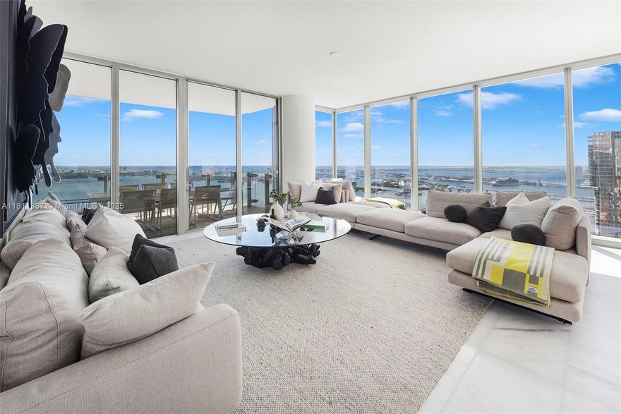 Live above it all at Missoni Baia in this generous 4-bed, 6-bath residence just beneath the penthouse, offering breathtaking 270-degree views of the bay, ocean, and city skyline. This sophisticated condo includes a den, staff quarters, and two deep terraces for seamless indoor-outdoor living. Soaring 10’ floor-to-ceiling windows, marble floors, and an Italkraft kitchen with WOLF & Sub-Zero appliances bring style and function together. Enjoy private elevator access, two parking spaces, and world-class amenities—all just minutes from Miami Beach, Downtown, and the Design District.