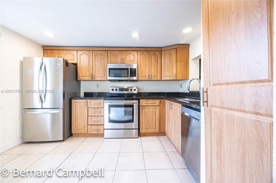 Experience resort-style living in a beautifully maintained 18-hole gated golf community with 24-hour security. This turnkey 2-bedroom, 2-bath condo offers 1,260 square feet of thoughtfully designed living space, featuring an open family and dining area perfect for relaxing or entertaining. Step directly from your bedroom onto your private patio and enjoy the peaceful surroundings. The spacious primary suite includes a comfortable sitting area and generous walk-in closets. The kitchen is appointed with granite countertops and stainless steel appliances, blending style and functionality. Tile flooring runs. throughout the main living areas, with laminate wood flooring in the bedrooms for added warmth and comfort. A washer and dryer are conveniently located inside the unit. Residents enjoy an impressive array of amenities, including a fitness center, swimming pools, billiards room, library, and community center. Water and cable are included, adding exceptional value and convenience. Association requirements include a 710+ credit score, minimum $45,000 annual income, 20% down payment, and 55+ residency. Don’t miss this opportunity—schedule your showing today!