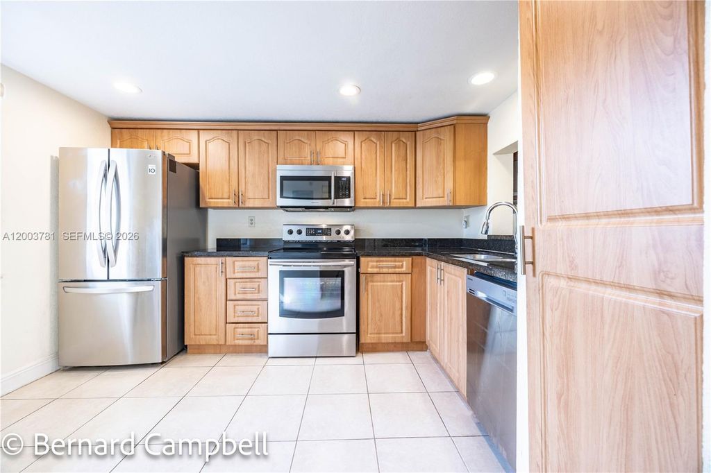 Photo of 3940 Inverrary Blvd #403-A, Lauderhill, FL 33319 (MLS # A12003781)