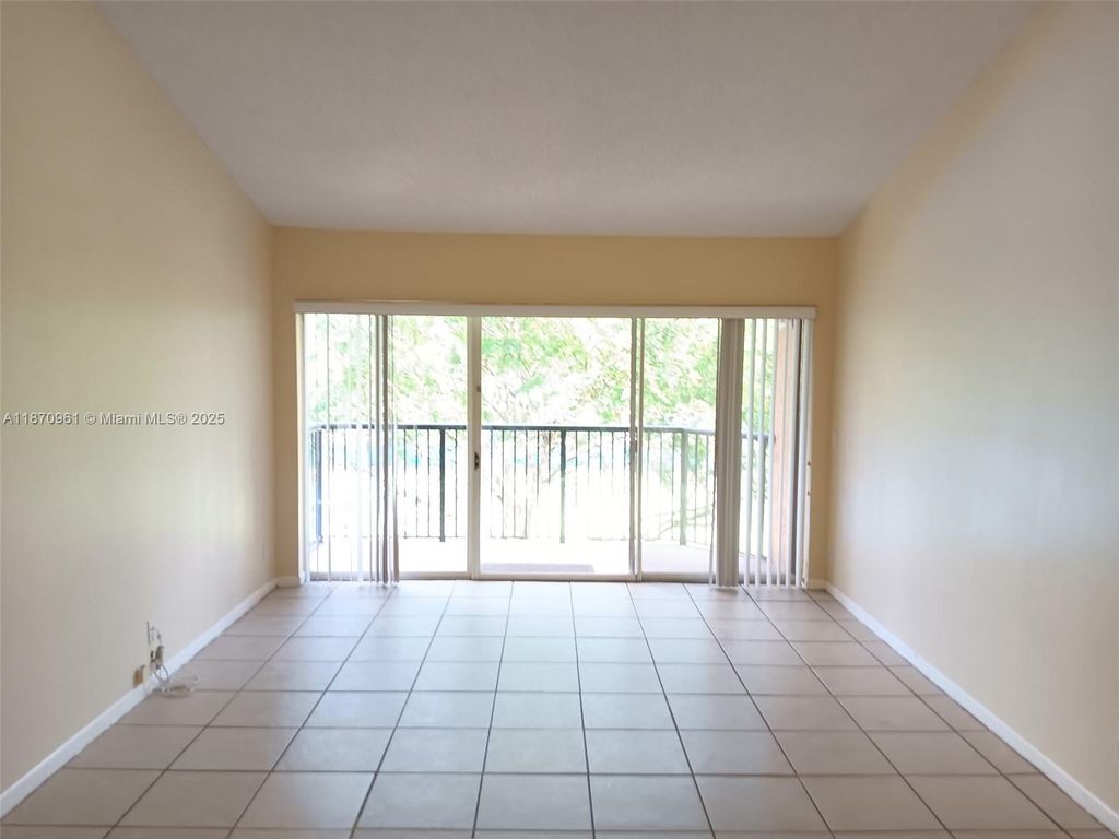 Photo of 8821 Wiles Rd #308, Coral Springs, FL 33067 (MLS # A11870961)