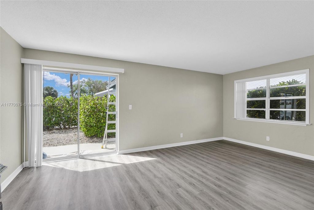 Photo of 592 Holly Dr #A, Palm Beach Gardens, FL 33410 (MLS # A11770075)