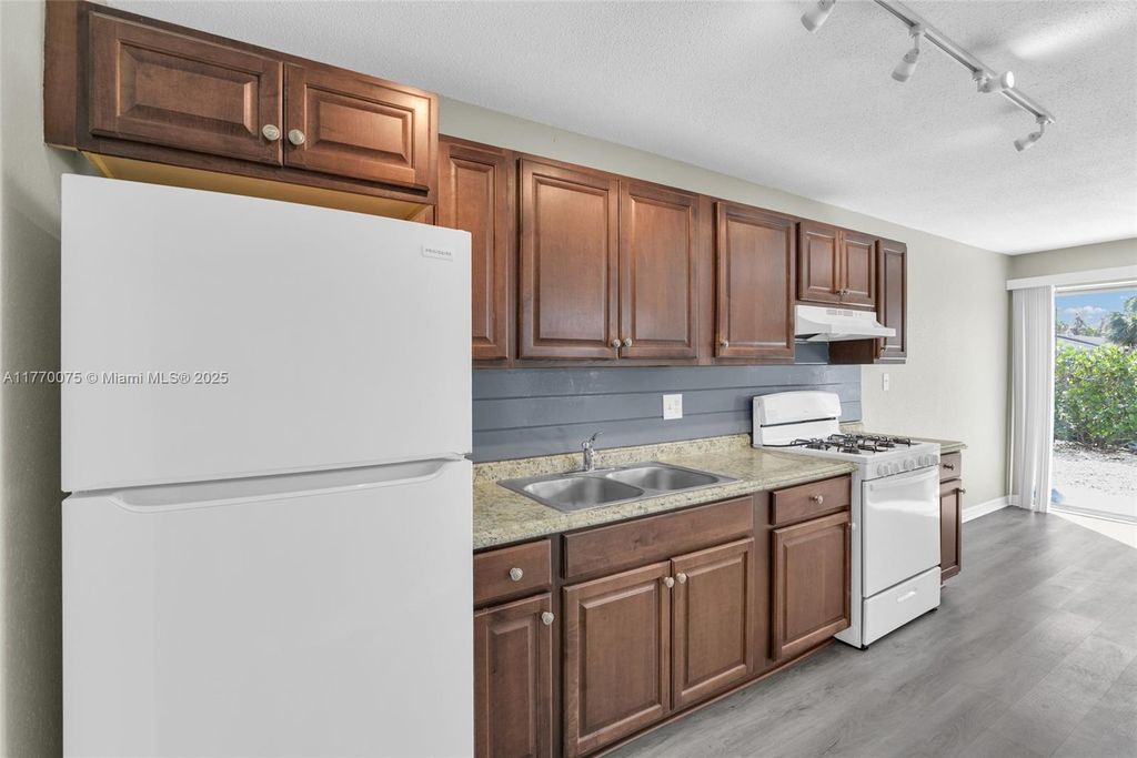 Photo of 592 Holly Dr #A, Palm Beach Gardens, FL 33410 (MLS # A11770075)