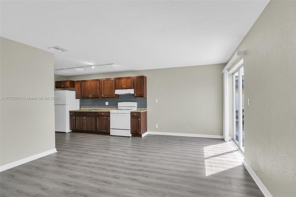 Photo of 592 Holly Dr #A, Palm Beach Gardens, FL 33410 (MLS # A11770075)