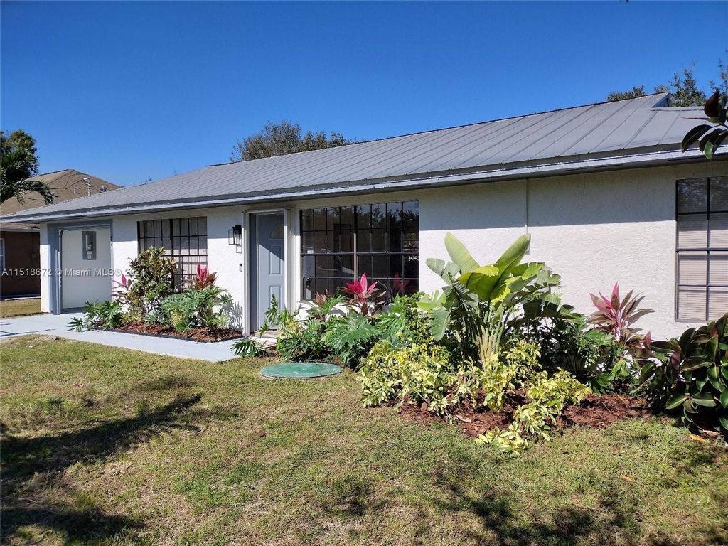 Photo of 841 NW Riverside Dr, Fort Pierce, FL 34983 (MLS # A11518672)
