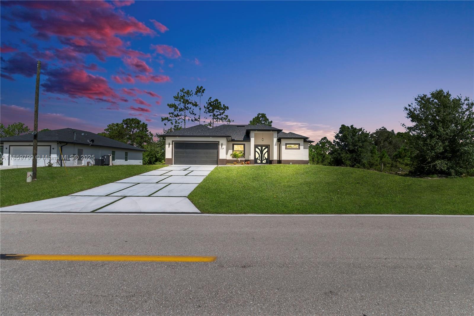 Modern new construction featuring 3 spacious bedrooms plus a den ideal for a home office, and 2 full bathrooms with high-end finishes. This bright and elegant home offers glossy white porcelain floors throughout, modern ceiling fans in every bedroom, and custom built-in closets. The open-concept kitchen is equipped with state-of-the-art appliances and sleek contemporary lighting.
Enjoy Florida living at its best with an outdoor kitchen perfect for entertaining family and friends.
Move-in ready, full of natural light, and designed for comfort and style. Don't miss this incredible opportunities!