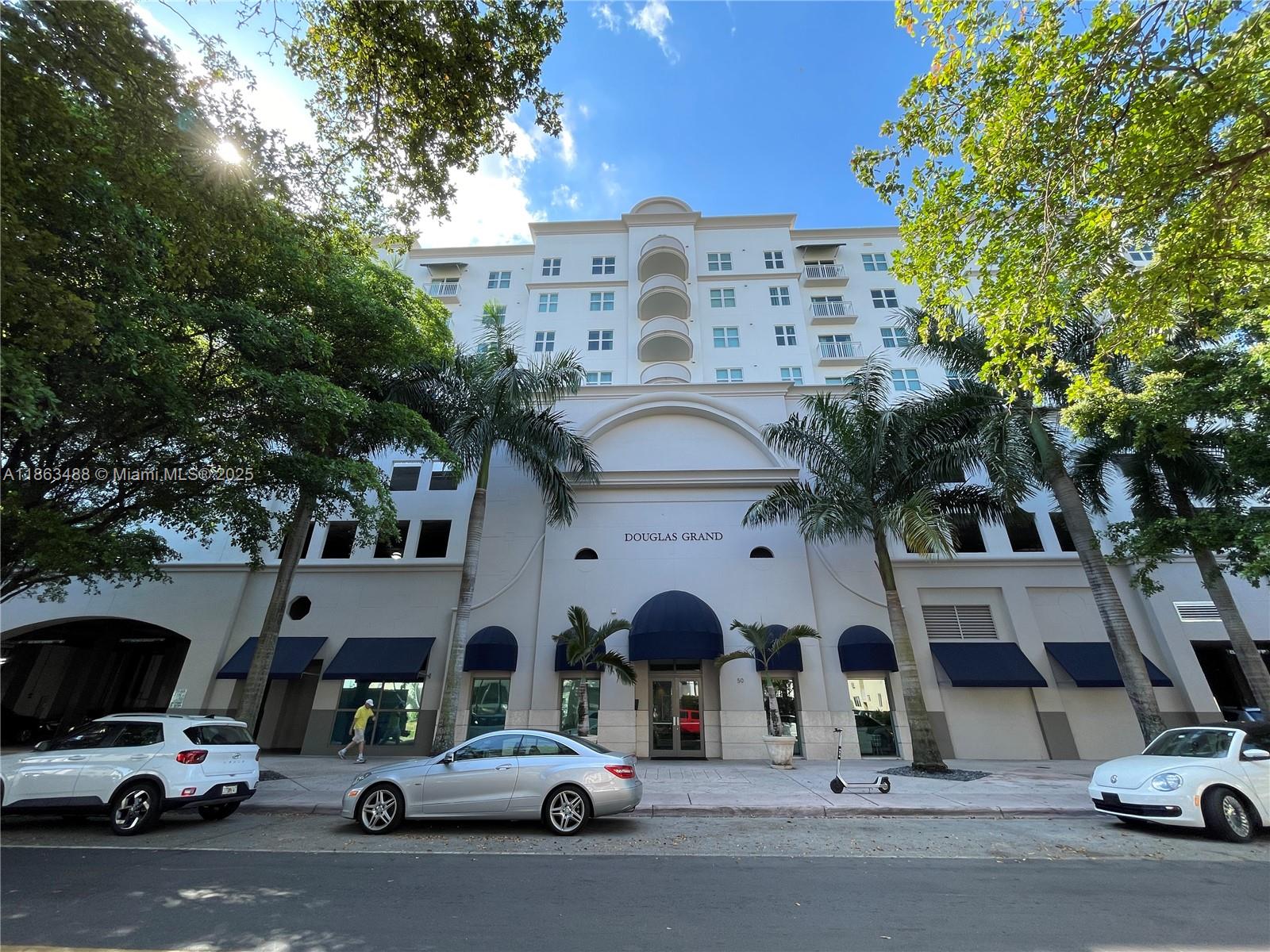 Bright apartment in Douglas Grand, in the heart of Coral Gables. Features tile floors in the foyer & kitchen, and wood laminate floors in the living room & bedroom; washer/dryer; small balcony; impact windows & doors; bedroom walk-in closet & hall closet. Tons of amenities included: free cable TV & Internet, concierge, security, large pool, gym and assigned garage parking. GREAT location—on one side of building is a Publix market & deli; and on the other side is a beautiful park with a walking path, basketball, tennis, baseball & soccer courts, picnic & children ’s play areas. It’s a short walk to Miracle Mile for dining & entertainment and a short drive to much more! CAN BE RENTED FURNISHED OR UNFURNISHED FOR THE SAME PRICE. If you don’t need the furniture, owner will take it out.