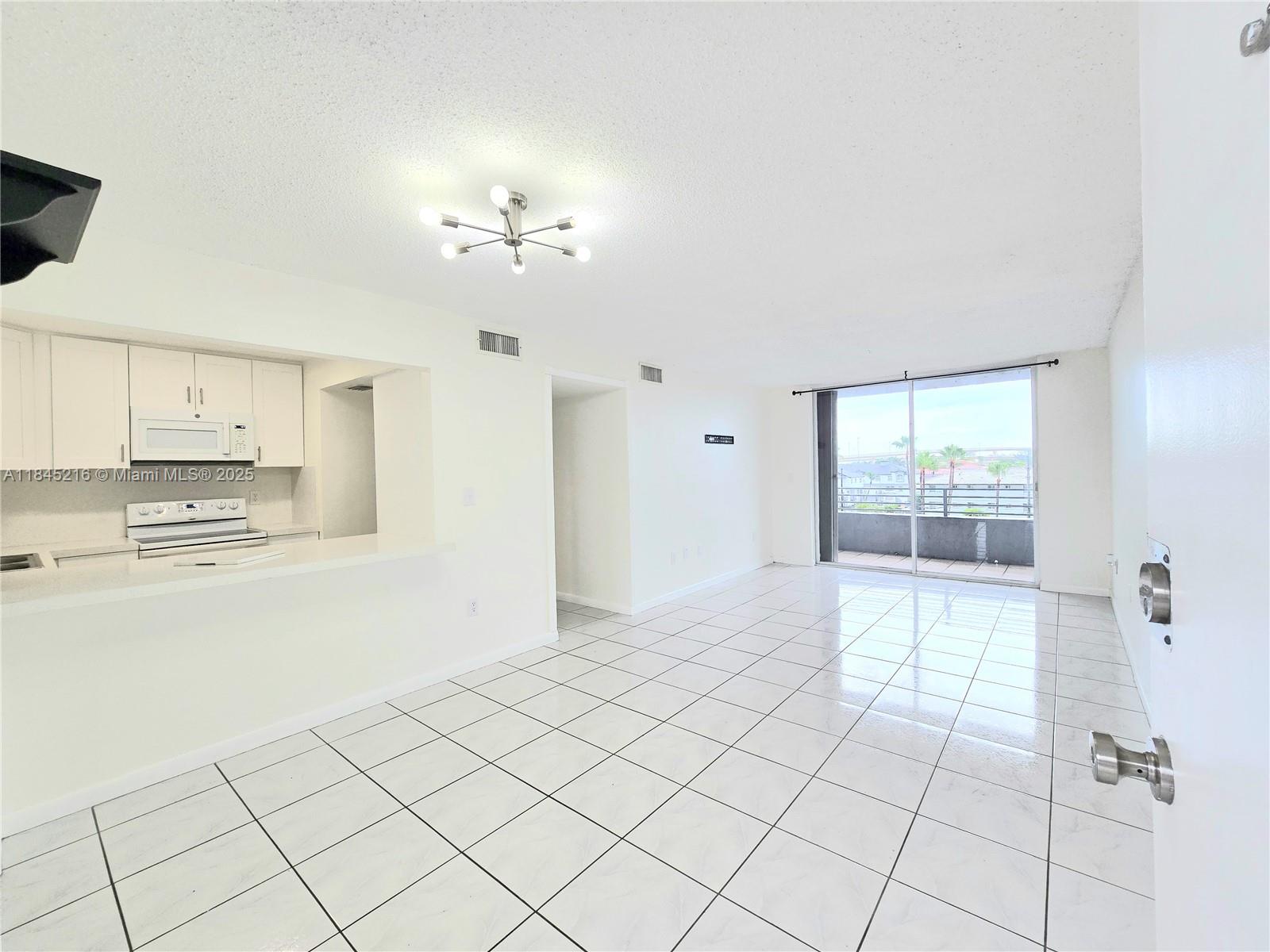 Location matters—and this 2-bed, 2-bath condo has it all! Perched on the 5th floor, it’s drenched in natural light with two private balconies perfect for relaxing. Enjoy a sleek, renovated kitchen with quartz countertops, in-unit washer/dryer, accordion shutters, and two assigned parking spaces plus guest parking. The gated community offers peace of mind and a sparkling pool. Minutes to Doral, the airport, shopping, and dining. Please note that, although we love pets, we have a strict no-pets policy.