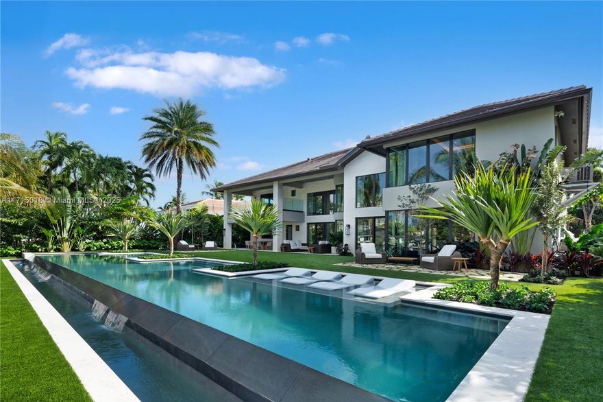 Villa Encanto: Redefining an exceptional, contemporary lifestyle in prestigious Golden Isles with unmatched exclusivity, privacy and harmony. This exquisite architectural masterpiece boasts 6 bed + 8 bath with every detail meticulously curated and redesigned by the elite Pietra Casa Studio. Premier hand selected marbles, European millwork and custom-made furniture from around the globe truly make this residence unique and flawless; every space is a statement. Outdoor grandeur meets maritime lifestyle with one of SoFL’s largest infinity pools complete with spa, tropical lounge areas, summer kitchen and 100 ft private dock. Perfectly situated near private airports, renowned golf and leisure clubs, and unparalleled dining. Furniture to be sold with property at additional cost.