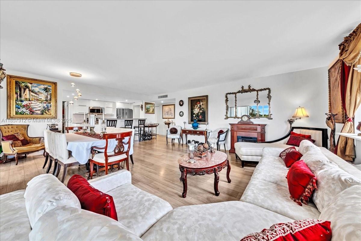 Welcome to this spacious 2-bedroom, 2-bathroom corner unit condo in the highly sought-after Hillcrest community in Hollywood, Florida. With 1,372 sq ft, this is the largest unit in the complex, featuring an open layout that seamlessly connects the kitchen, living, and dining areas—perfect for entertaining or relaxing. Enjoy the enclosed balcony, ideal for a morning coffee or evening breeze. The master bedroom offers a walk-in closet, and the condo includes a full-size washer and dryer for added convenience. High-impact windows throughout provide peace of mind and energy efficiency. The building offers 2 parking spaces, extra storage and a bike room, and the community amenities include a heated pool, clubhouse, and BBQ area—perfect for enjoying Florida living year-round.