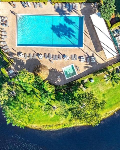 Photo of 2312 S Cypress Bend Dr #107, Pompano Beach, FL 33069 (MLS # A12003188)