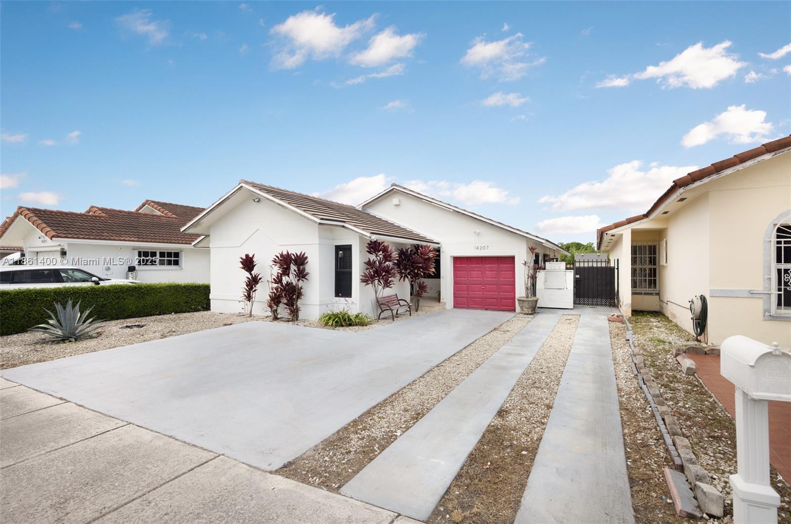 Beautiful 4/2 with impact windows & doors, 2022 tile roof, tankless water heater, remodeled baths.Prime location near A+ schools. The left side of the house can be used as a private in-law suite if needed.