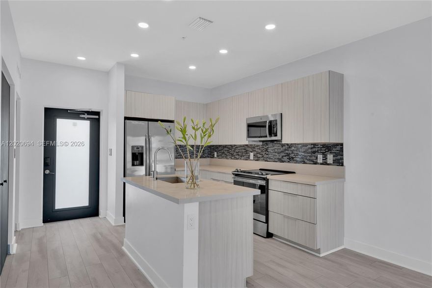 Beautiful corner unit apartment with stunning natural light, located in one of the best areas of Doral. Conveniently situated next to the highly sought-after Downtown Doral Charter Elementary School.

This move-in ready unit features stainless steel appliances, elegant quartz countertops, and an in-unit washer and dryer for your convenience. All rooms include custom closets, and the beautiful upgraded flooring adds a modern and elegant touch throughout the home.

The unit has had only two owners and has been exceptionally well maintained, keeping it in perfect condition and truly ready to move in.

The community offers amazing amenities, including a basketball court, billiard room, children’s play area, clubhouse, pool and fully equipped gym. Enjoy the convenience of being within walking distance to Downtown Doral, featuring some of the best restaurants, shops, and entertainment in the area.

A perfect combination of comfort, style, and location.
HOA $613.20 + CLUB HOUSE $223.36 TOTAL $836.56