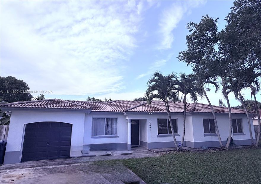 Step into this stunning Mediterranean-style single-family home in Miami, just 10 minutes from South Land Mall and 20 minutes from BlackPoint Marina.
Inside, you'll find a beautifully remodeled modern kitchen and bathroom, designed for style and functionality. Tile floors throughout add a sleek, easy-to-maintain touch.
Enjoy seamless indoor-outdoor living with a screened patio, perfect for relaxing or entertaining. The large yard offers endless possibilities—whether adding a pool or cultivating a garden oasis.
Nestled near parks, schools, and shopping, this home combines convenience, comfort, and charm.
Additionally, it features a garage converted into an independent living space.