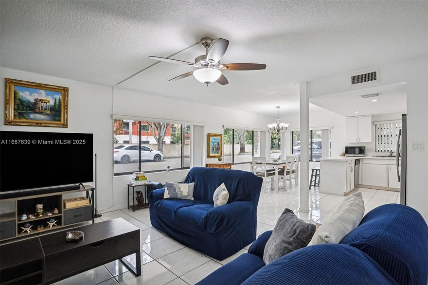 Bottom floor unit for easy move in!  Fantastic opportunity to own a spacious beautiful 2 bed/2 bath corner unit with an easy open floor plan in a prime location! New refrigerator and oven stovetop.  Stacked washer and dryer. Enjoy a walk to a garden pathway, and its close proximity to major highways, the Hard Rock Casino, shopping centers and the Fort Lauderdale airport. With no rental restrictions this condo is ready to go with an option to purchase the furniture for a turn key investment! Just minutes from Nova University and Broward College. You will also enjoy its close proximity to the beaches in Fort Lauderdale, Hollywood et al. Own your own slice of Sou!th Florida with a low HOA fee. Don't miss this opportunity - price improved for a fast sale. PREFER CASH OFFERS.