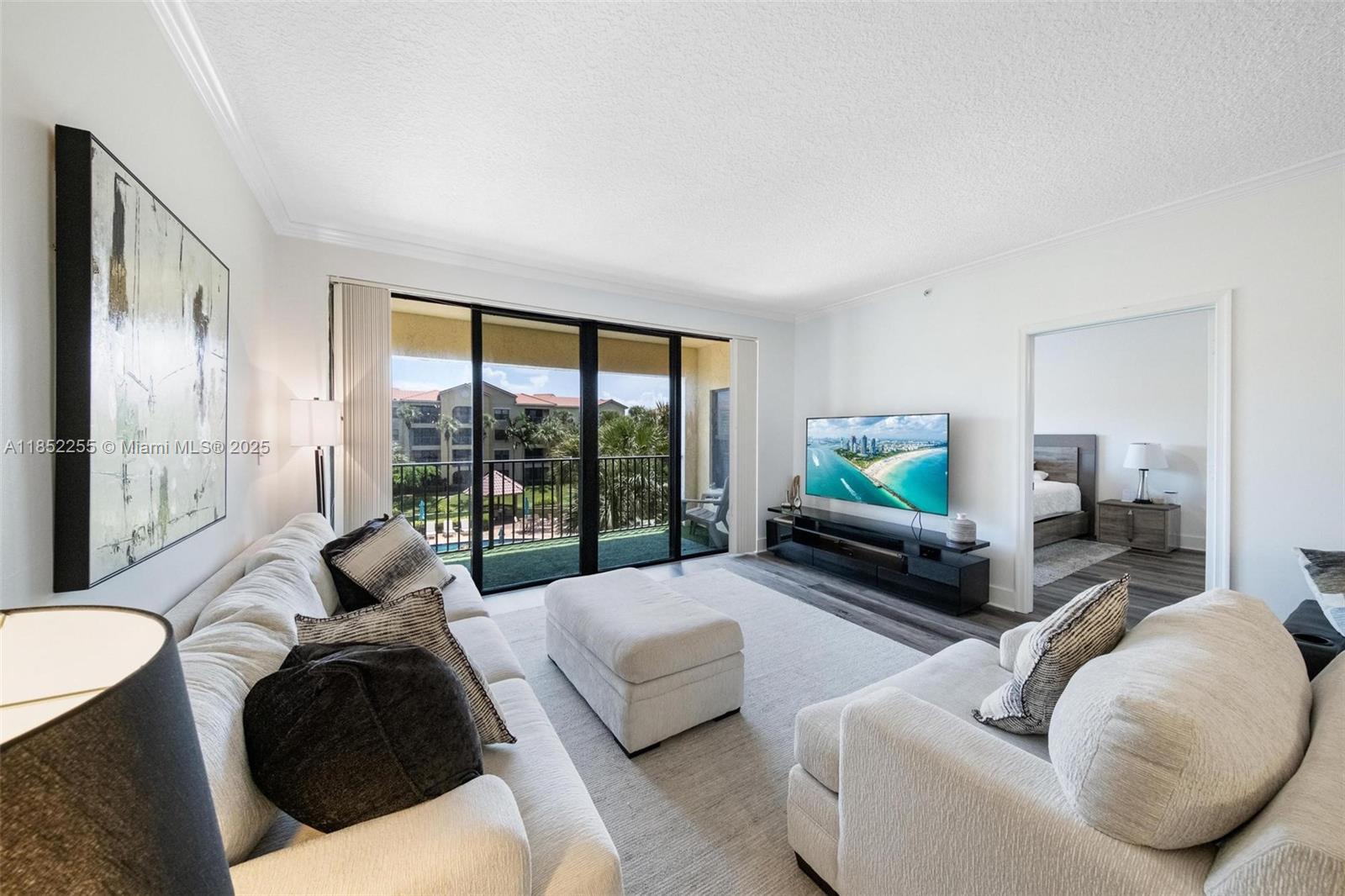 Welcome to 800 Uno Lago Dr #301 – a spacious and modern 3-bedroom, 2-bathroom condo offering 1,446 SF of comfortable living in the heart of North Palm Beach. This bright corner unit overlooks the community pool and features an open-concept layout with a sleek, updated kitchen, new appliances, and modern finishes throughout. Enjoy peace of mind with a new AC system, in-unit washer/dryer, and assigned parking. Located in a quiet, secure gated community just minutes from the beach, top shopping, dining, and more. Don’t miss this opportunity to live the South Florida lifestyle! 90 day minimum rentals allowed after 1 year of ownership.