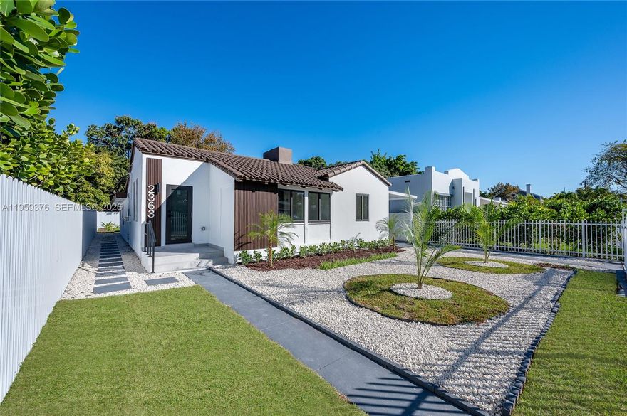 Stunning fully remodeled single-family home in the heart of Shenandoah, one of the Miami's most sought-after neighborhoods.  Ideally located just 5 minutes from Brickell and Coral Gables, this move-in ready residence perfectly blends contemporary design with modern comfort.
Step inside this 3 bedrooms/2 bathrooms property to discover a bright, open layout enhanced by sleek black accent details and high-end finishes throughout.  The bathrooms feature striking industrial-inspired tile flooring, while the rest of the house is outfitted with waterproof laminate floors that combine durability with modern style.  
Impact windows and doors provide both, elegance and peace of mind.
The expansive backyard offers ample space to design your dream pool, outdoor kitchen or entertainment area.
Perfect for buyers seeking a turnkey home in a prime location close to top dining, shopping and major highways.