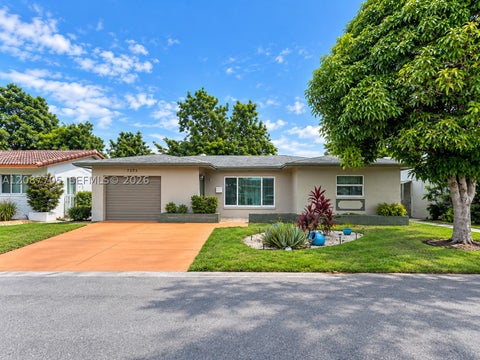 Photo of 7303 NW 59th St, Tamarac, FL 33321 (MLS # A12087705)