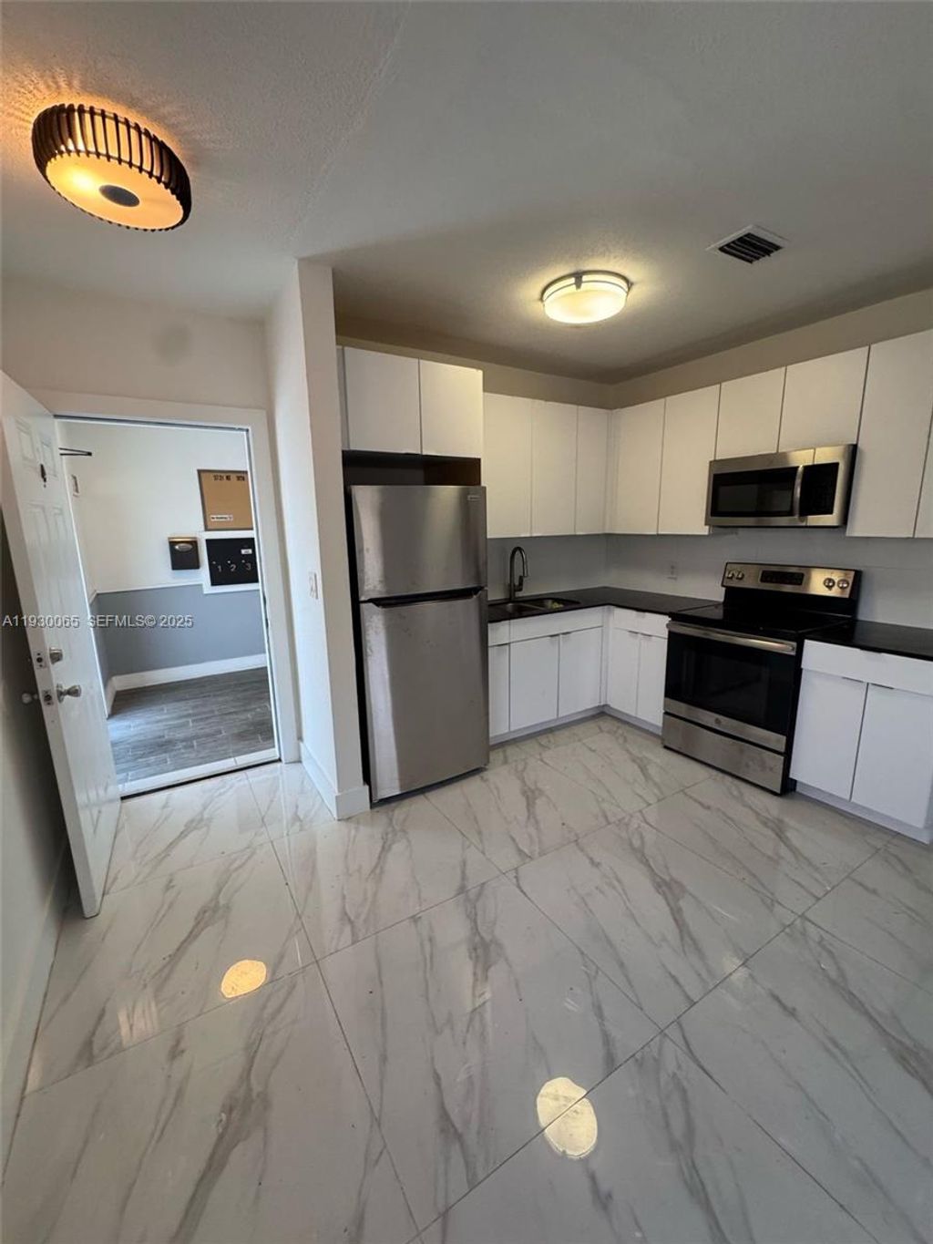 Photo of 5731 NE 18 Th Ave #4, Fort Lauderdale, FL 33334 (MLS # A11930065)