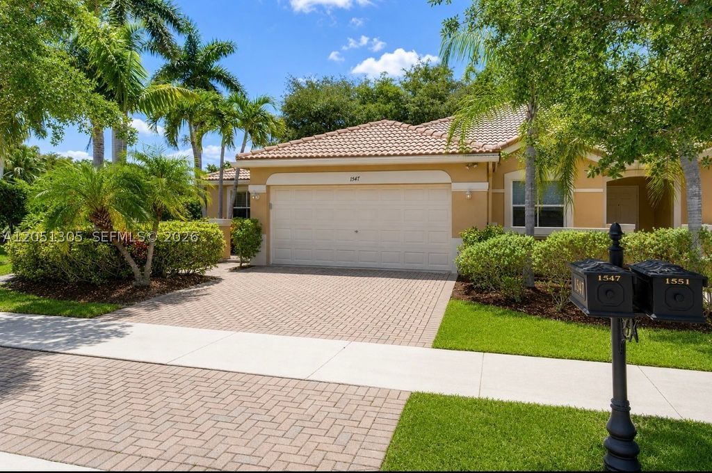 Photo of 1547 Zenith Way, Weston, FL 33327 (MLS # A12051305)