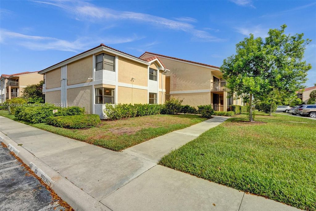 Photo of 5681 Riverside Dr #101A6, Coral Springs, FL 33067 (MLS # A11363993)