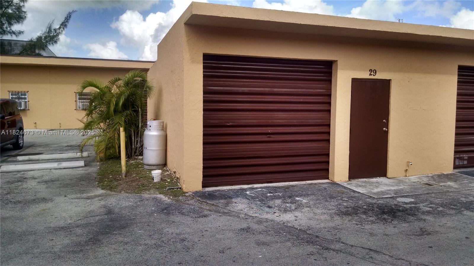 230 SF Warehouse Unit – Ideal for Storage or Start-Up Business
Compact warehouse space featuring one standard door and one overhead street-level bay door. Includes wall-mounted A/C unit and phone/internet capabilities. Approx. 13' x 18'. No bathroom. Great for storage or a small business. Rent plus sales tax.