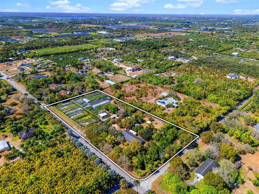 5 acre, single family home in the highly desirable Redland's area near Krome Ave. Situated on a prime corner lot, this property offers exceptional privacy, open space, and endless possibilities. The land features mature avocado, mango, and jackfruit trees, creating a true South Florida agricultural lifestyle setting. Whether you're looking to enjoy the existing fruit production, expand your grove, or simply embrace country living, this property delivers. With ample room to build your dream pool, expand, or create a private retreat, the potential here is unmatched. Enjoy peaceful Redlands living while still maintaining convenient access to Krome Ave and major roadways.