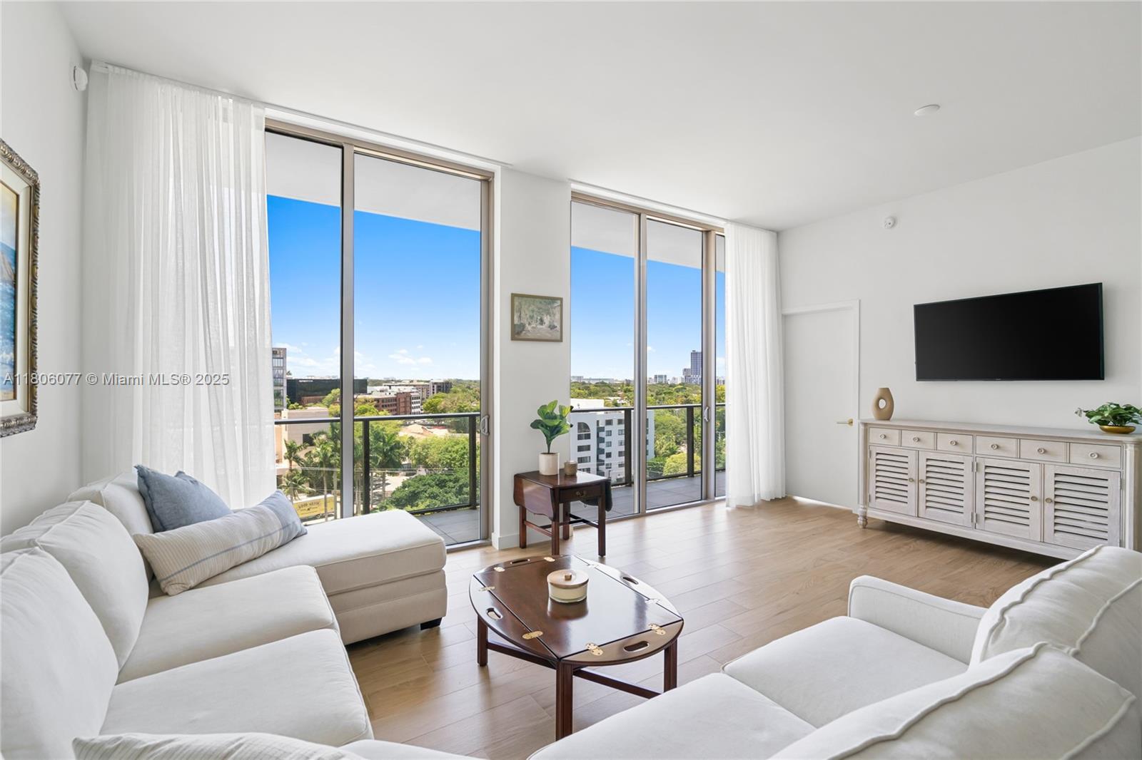 Modern and Elegant 2-bedroom, 2.5-bathroom condo boasting marina, skyline and grove views. Spanning 1,300 sqft, plus a 194 sqft balcony, this residence features 10-ft ceilings, floor-to-ceiling windows, and electric shades for ultimate comfort. The custom Italkraft kitchen is equipped with premium SubZero appliances and a water filtration system. Master suite features custom closets and a spa-like en-suite bathroom. Enjoy unmatched amenities, including a rooftop pool and sundeck, an additional resort pool deck with poolside bar and open-air lounge with bar & towel service, fitness center, lounge, conference room, office space, 24-hour valet and security, and a gourmet market. Just steps from CocoWalk dining, shops, parks, and all the charm of Coconut Grove.