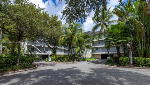 Photo of 6815 Edgewater Dr #108, Coral Gables, FL 33133 (MLS # A11893883)