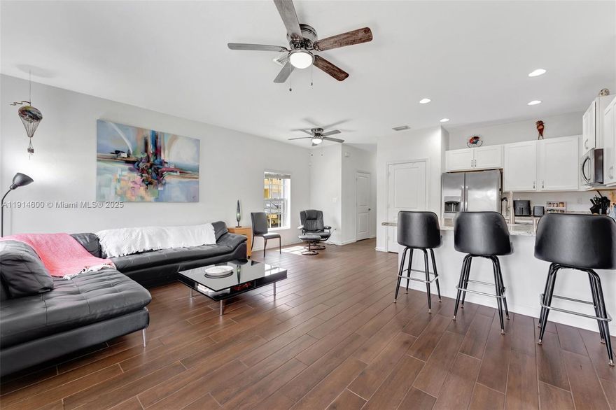 A rare opportunity to own a corner-unit townhome in a gated community with a bright, modern layout and incredible natural light. The first floor offers spacious connected living spaces and a crisp contemporary kitchen with stainless steel appliances and upgraded cabinetry. Upstairs features three comfortable bedrooms with great closets and a private retreat feel. Accordion shutters provide full storm protection. Enjoy a fenced patio for outdoor living, a 1-car garage, two driveway spaces, and convenient guest parking close by. All in a prime Broward location just minutes to beaches, highways, FLL Airport, restaurants, shopping, and Las Olas. Move-in ready and beautifully maintained.