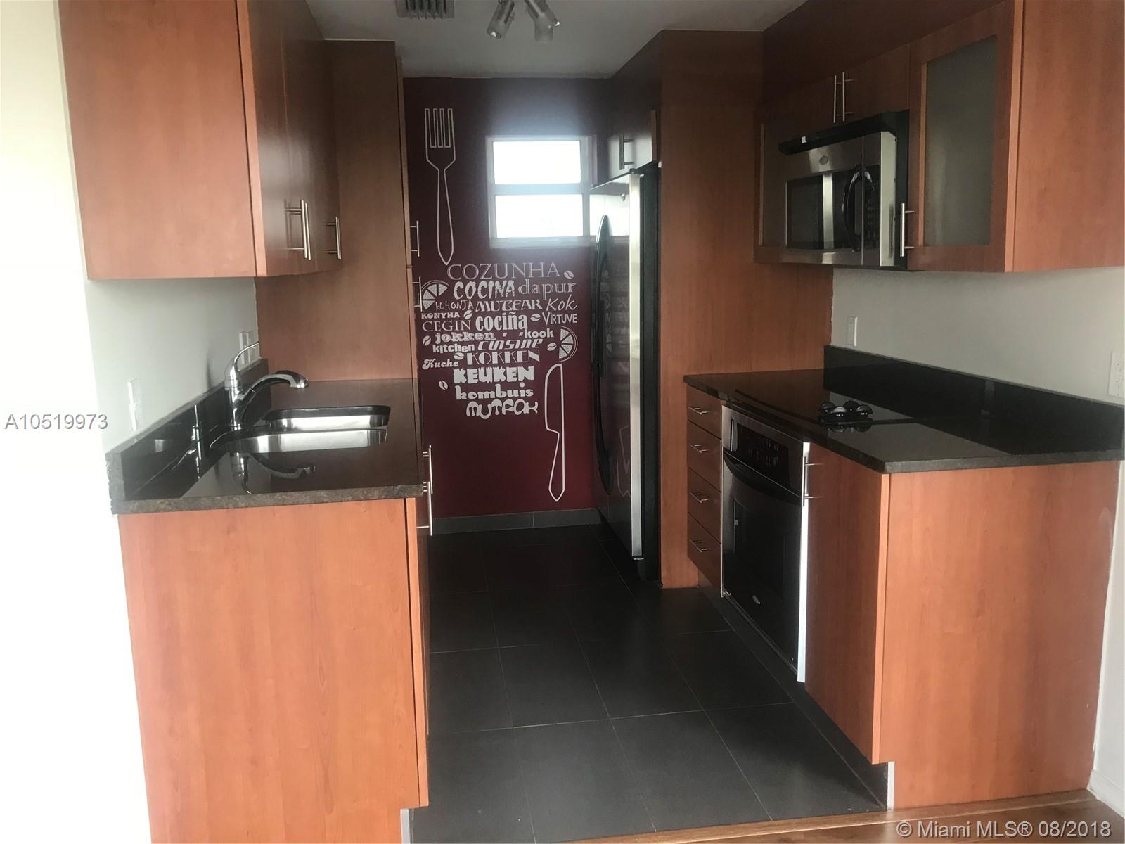 BRICKELL ROADS ATRIUMS CO - Residential Lease