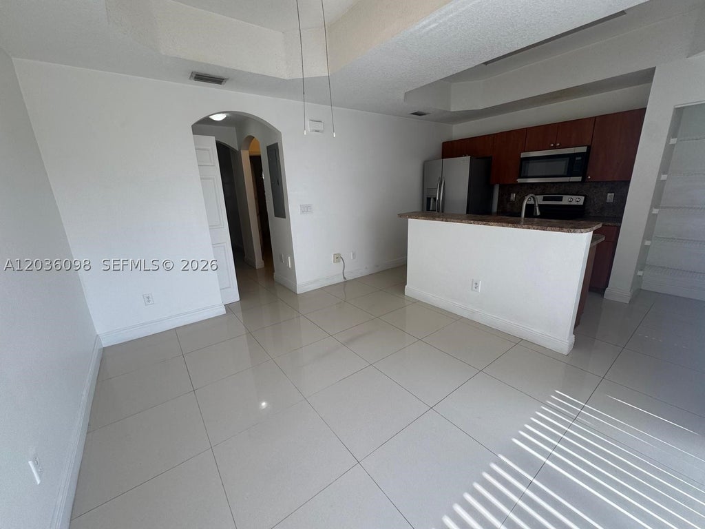Photo of 4941 Tradewinds Ter #805, Dania Beach, FL 33312 (MLS # A12036098)