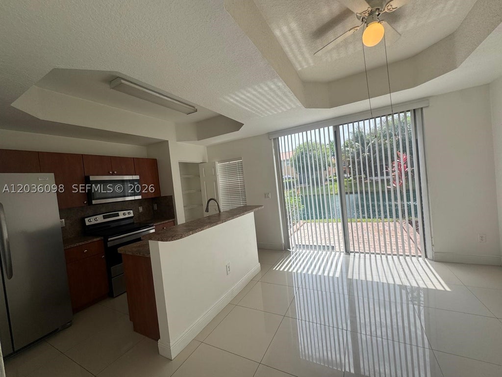 Photo of 4941 Tradewinds Ter #805, Dania Beach, FL 33312 (MLS # A12036098)