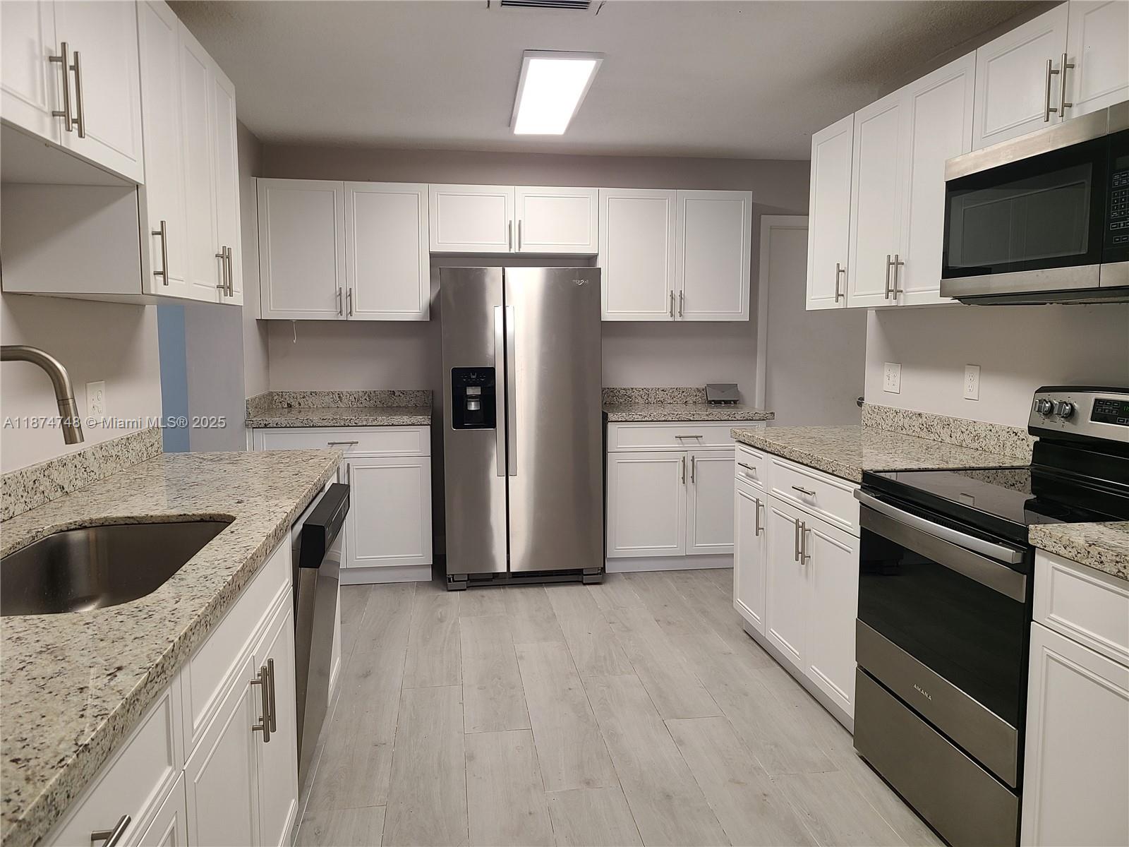 Come see this stunning, fully remodeled spacious home! Featuring 3 bedrooms and 2 bathrooms, this residence offers plenty of room for comfortable living. The usable garage provides ample storage and convenience. Enjoy the modern touch with a dedicated laundry room equipped with a whole house water filter and conditioning system, ensuring clean and fresh water throughout. Situated in a peaceful, quiet neighborhood, with community pool and club house. Whether you're relaxing in the large living spaces or entertaining guests, this beautifully updated property combines functionality with comfort in a desirable location.