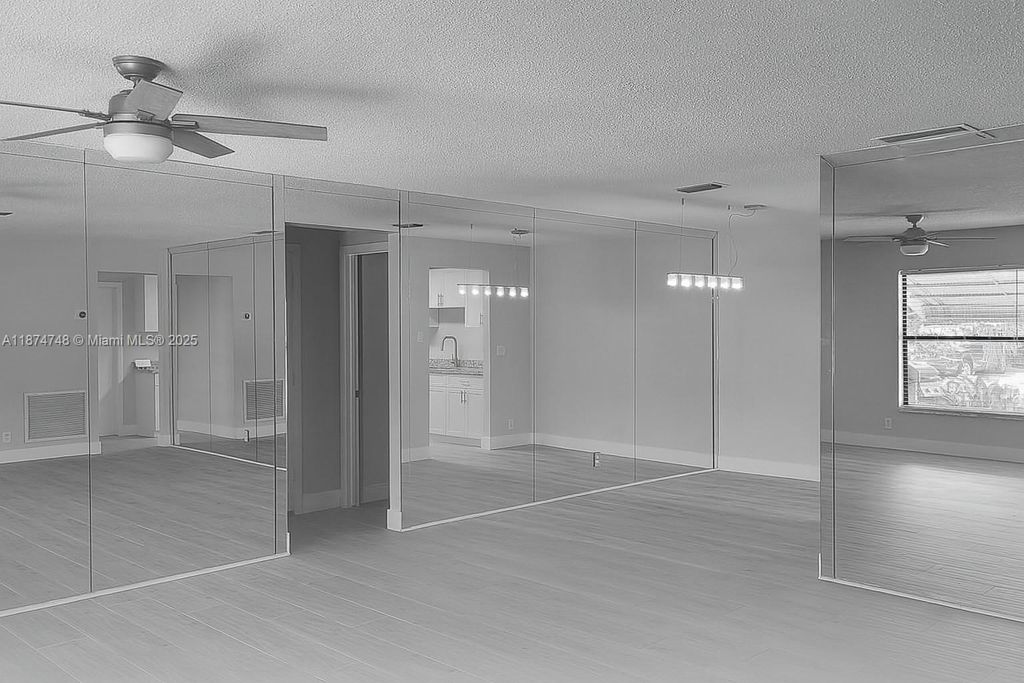 Photo of 4751 NW 12th Dr, Deerfield Beach, FL 33064 (MLS # A11874748)