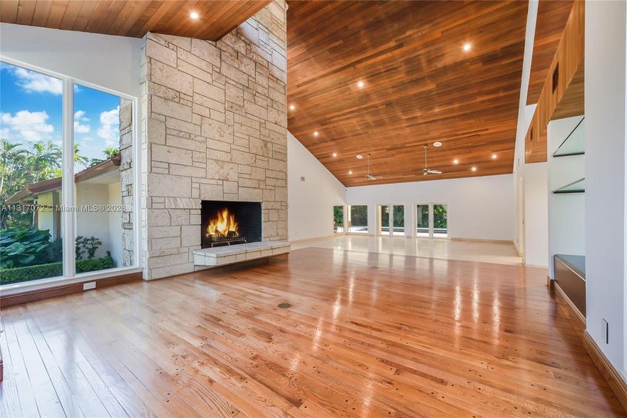 HUGE PRICE REDUCTION !Pinecrest Grove- Gated Community of only 9 homes, all on 1 + acre lots- Award Winning Hollub Design - Huge 43,560 sf wide lot- many fruit trees,6 bedrooms 4 1/2 baths, 6734 sf under AC, Total 8073 sf . Impact windows + doors, metal roof, back up generator, 2 garages ( 2 car+ 3 car ) Total 5 car garage. 2 master suites,fitness room or home theatre, Indoor Laundry, Huge Formal Dining room,Impressive High Wood beam Living room with tall coral rock stone fireplace. Covered outdoor terraces with outdoor kitchen, lots of covered outdoor covered seating around the pool, Lush landscaping, circular driveway, very private back yard. This is a unique home in a very desireable pineccrest gated communit. House is Immaculate and ready to move in.