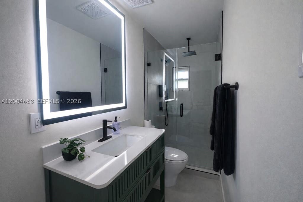 Photo of 4396 SW 25th Ter #1-2, Dania Beach, FL 33312 (MLS # A12004438)