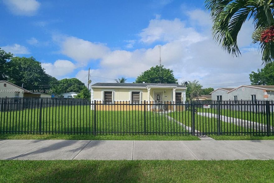 Charming gated home in the heart of Miami Gardens! This well-maintained property features a spacious outdoor lot, perfect for entertaining or future enhancements. Inside, enjoy a fully equipped kitchen with oven, stove, and refrigerator, plus a beautifully renovated master bathroom complete with marble tile and a relaxing spa tub. A fantastic opportunity to own a private, comfortable home with room to grow!