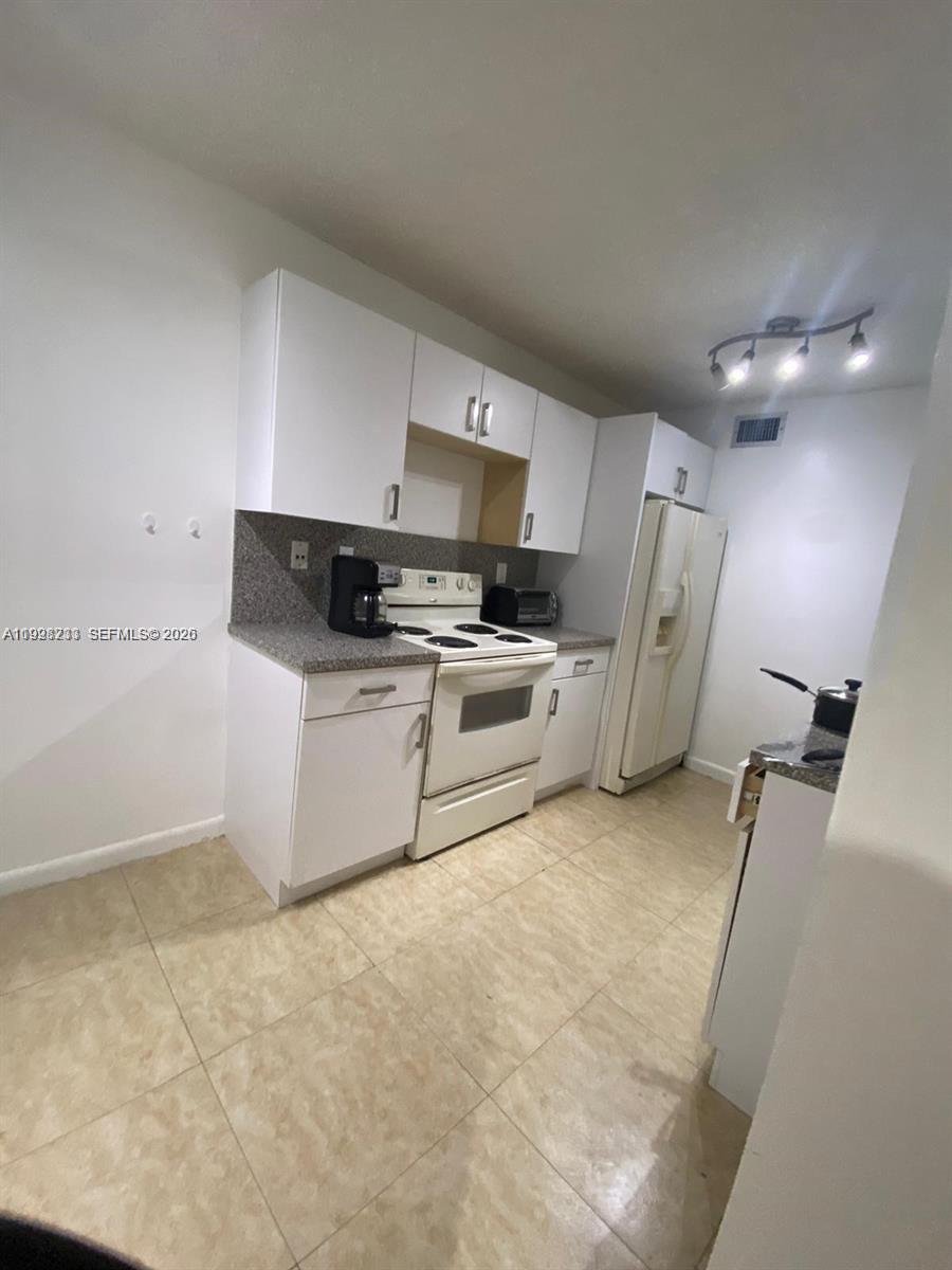 THE GREENS AT DORAL CONDO - Residential