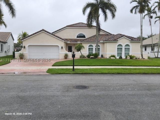 Photo of 9012 Southern Orchard Rd N, Davie, FL 33328 (MLS # A12114131)