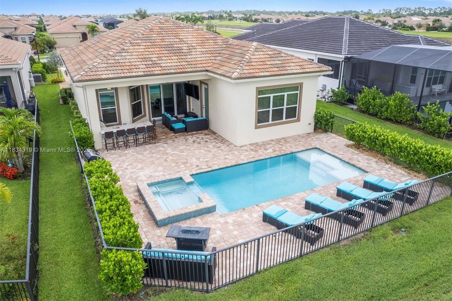 Exquisite 3-bedroom, 2.5-bath home with heated pool and a versatile den/flex room, located in the prestigious PGA Village Verano neighborhood within the 55+ community of Cresswind. This 2022-built home showcases refined upgrades throughout, including a gourmet kitchen with smart ovens, expansive island, custom pantry, and tailored closets. The luxurious owner’s suite offers dual shower heads, while the guest bath features a sleek walk-in shower. Enjoy seamless indoor-outdoor living with a full summer kitchen overlooking the heated pool and spa, all app or panel controlled. Community amenities rival top resorts—lap and resistance pools, dual fitness centers, 27 pickleball courts, tennis, clubhouse, and more. This is a 55+ community, allowing up to 20% under age 55.