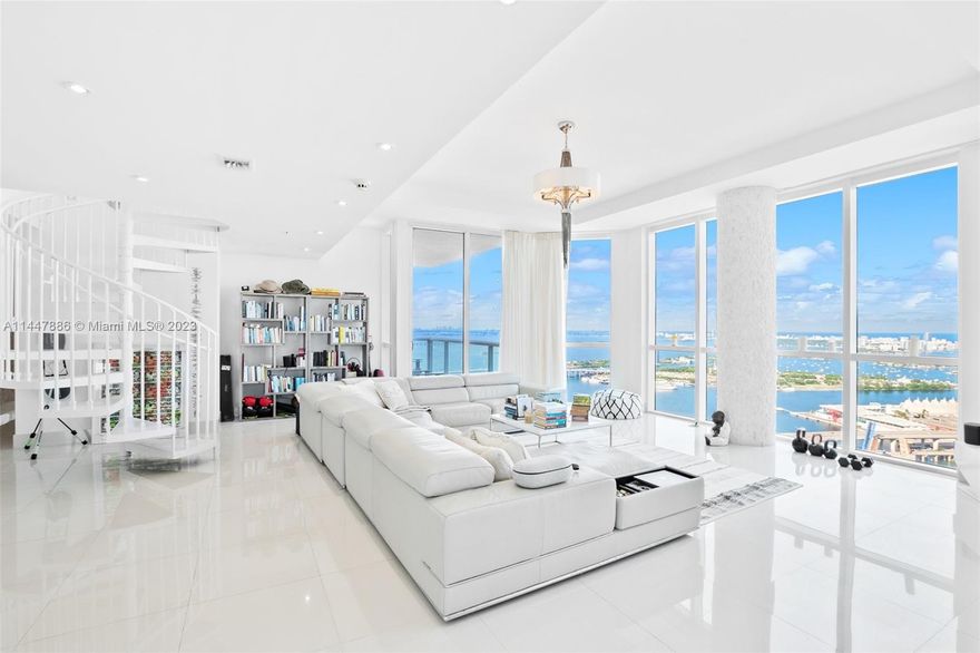 Enjoy luxury living & the best of Miami. This condominium offers endless breathtaking views of Miami Bay & the heart of downtown Miami. This penthouse features stainless steel kitchen appliances, granite countertops, Italian wood cabinets, & private balcony w/glass railings. There is an extensive living room; open concept, enjoy friends & family for entertainment or relax at home.  Including exclusive private rooftop terrace where you can have personal gatherings or use for your enjoyment. This three bedroom three & a half bath two story penthouse includes a primary en-suite bedroom where you enjoy waking up to the most sought out views in Miami!  Featuring two secondary bedrooms great for guests, office use or potential gym/ yoga studio. Comes with three garage parking spots and storage.