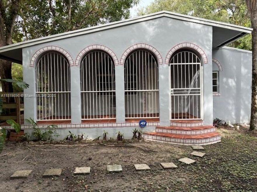 Located on a beautiful treelined street in sought after South Miami. This home offers 4 bedrooms, each with its own bathroom, and semi open living, dining and kitchen. Built in 2000 and used for student housing. The spacious 9300 sft lot is shaded by mature oaks and other trees.