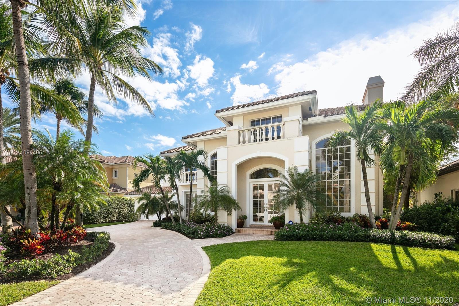 Welcome home to this beautiful Mediterranean waterfront residence boasting 4 bedrooms and 4.5 bathrooms located in the exclusive community of Tropic Isle! This two story gem features volume ceilings, newer porcelain tile floors throughout the main level and wood floors on the second level. Enjoy a remodeled kitchen with custom cabinetry and wine fridge. This home also includes 3 outdoor balconies and a tropical outdoor living space with a pool and spa surrounded by lush landscaping. Boater's dream home with 90 ft of deep water frontage, just 1 lot away from the Intracoastal waterway and no fixed bridges.