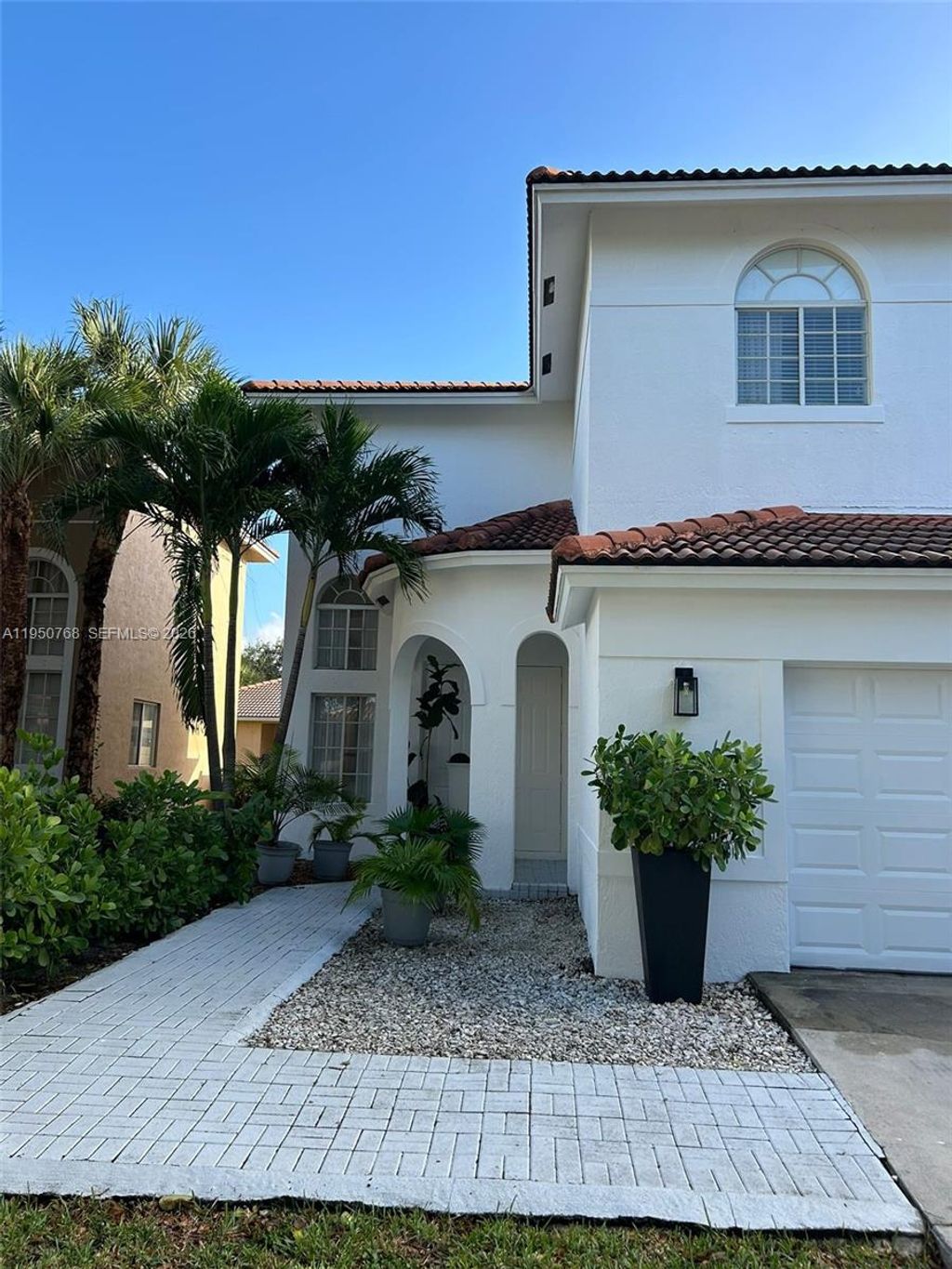 Photo of 14146 SW 31st St #14146, Miramar, FL 33027 (MLS # A11950768)