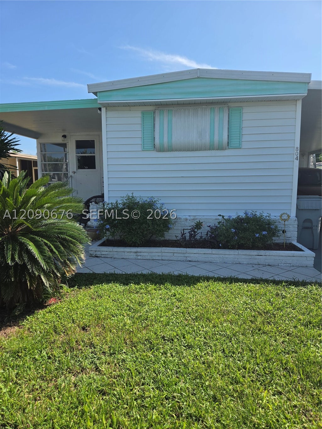 Photo of 804 Par Drive, Pompano Beach, FL 33069 (MLS # A12090676)